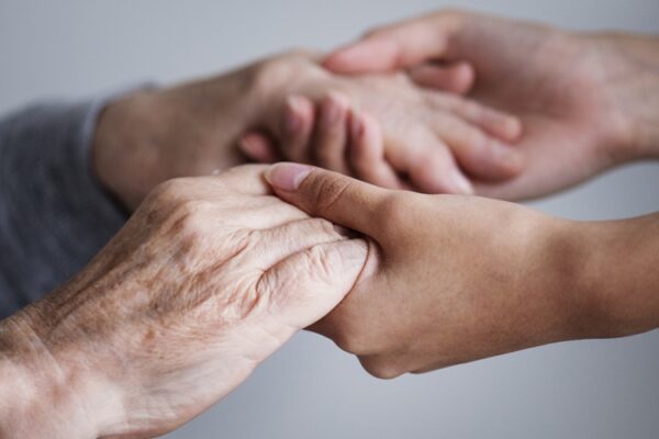 Closeup of a support hands Alzheimers Disease