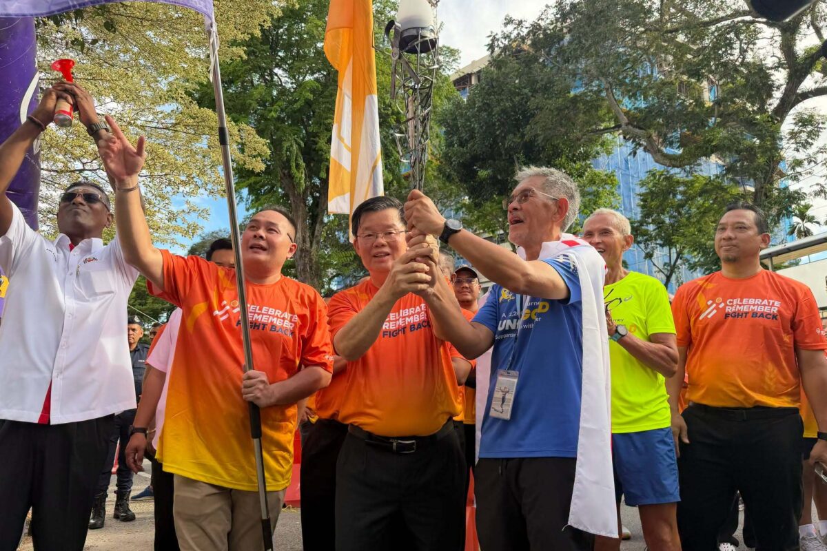 Welcoming Home Mr. SG Lim After His 2,200km Run for Gold-1